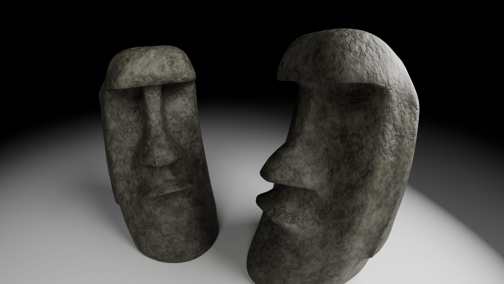 Two Moai statues facing each other in a softly lit scene